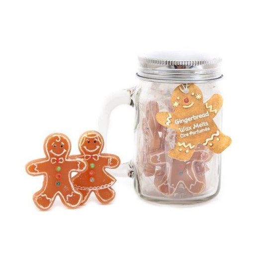 Glass jar with gingerbread man design on a white background