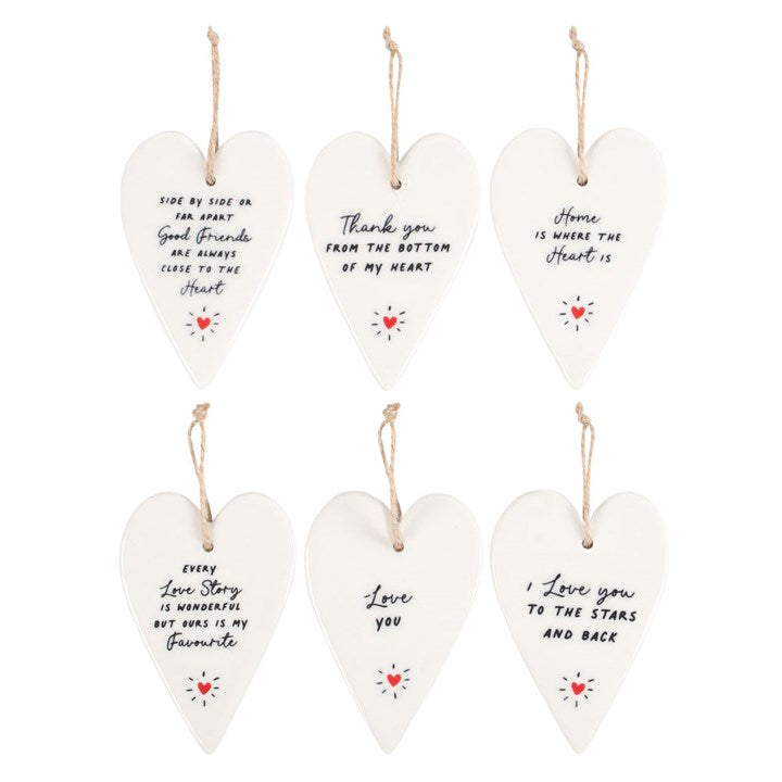 Set of 24 Heart Ceramic Mini Signs on Display